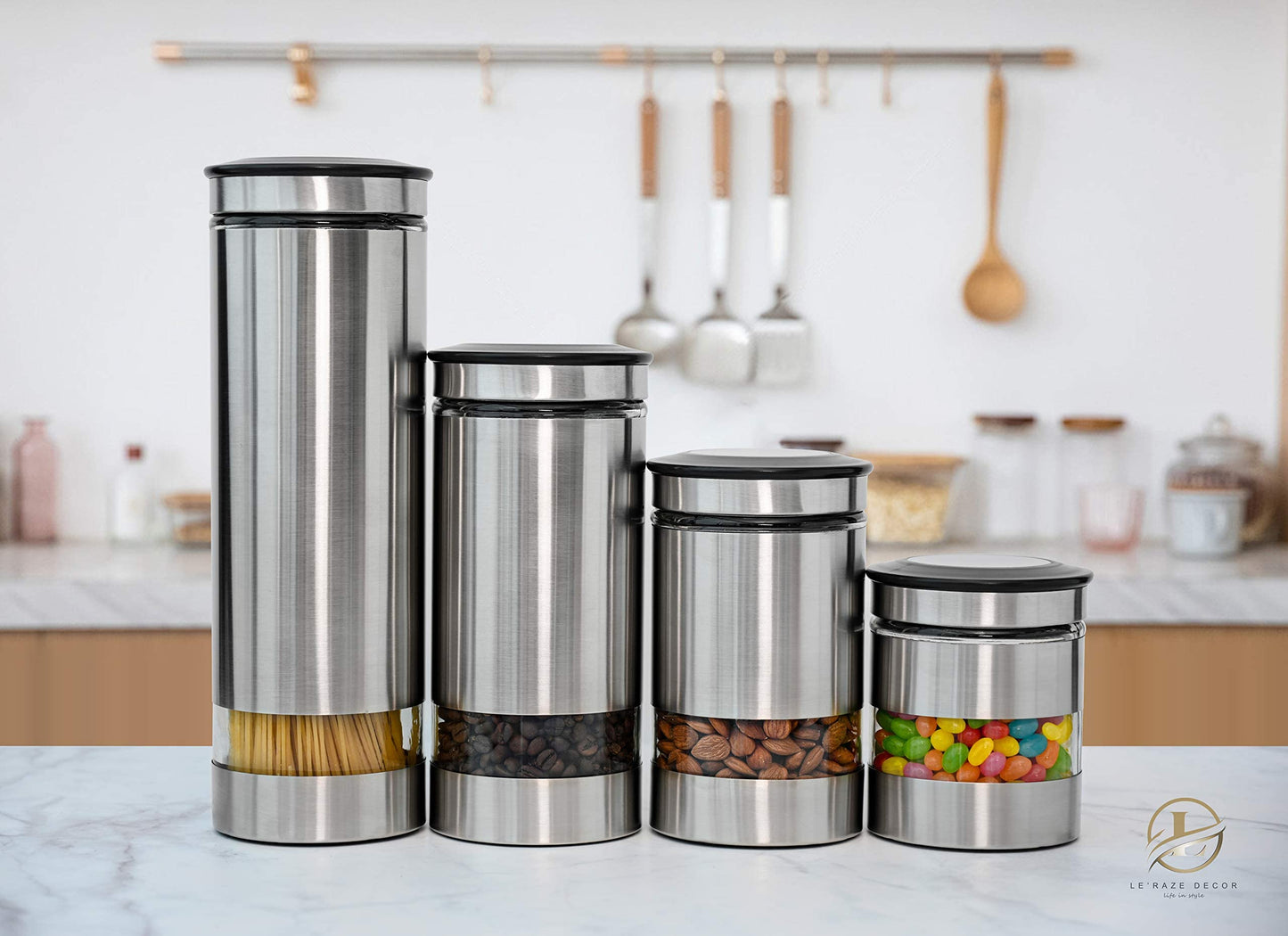 Le'raze Airtight Glass Canister Set of 4 with Stainless Steel Sleeve for Kitchen Counter - Food Storage Containers with Glass Window and Airtight Lids - Pantry Storage and Organization Set
