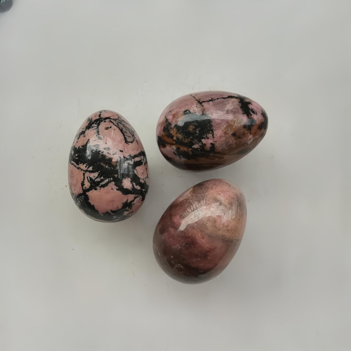 Sunshcat Natural Rhodonite Egg Shaped Meditation Chakra and Home Decor Balance Crystals and Healing Stones Statue Set,35 * 50mm Easter and Thanksgiving Gift,with Wooden Bracket