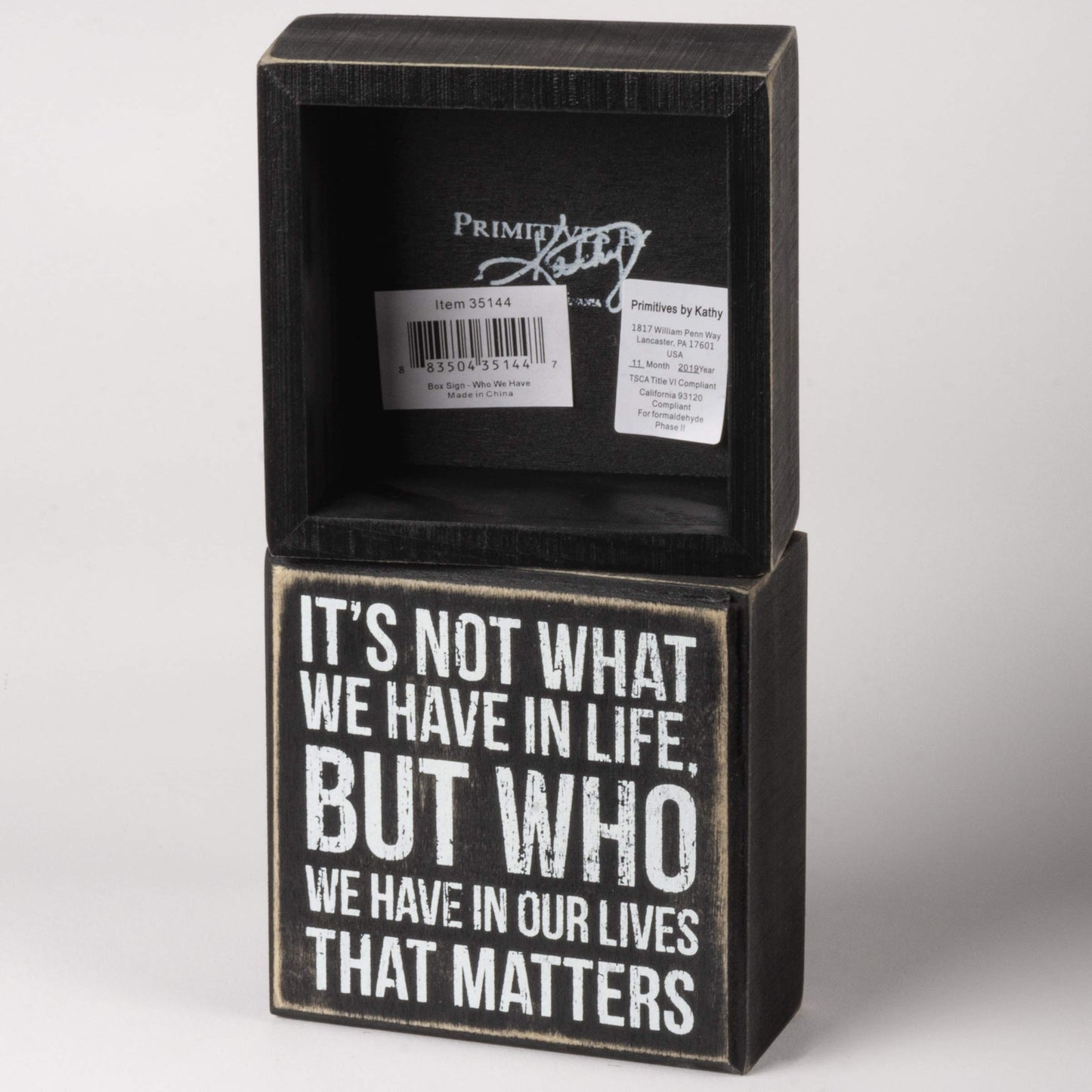 Primitives by Kathy 35144 Classic Black and White Box Sign, 4 x 4-Inches, Who We Have