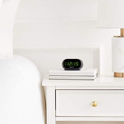 Amazon Basics Small Digital Oval Alarm Clock with LED Display, Nightlight, Snooze Function & Battery Backup, Black, 4.5 x 3.5 x 2.4 Inches