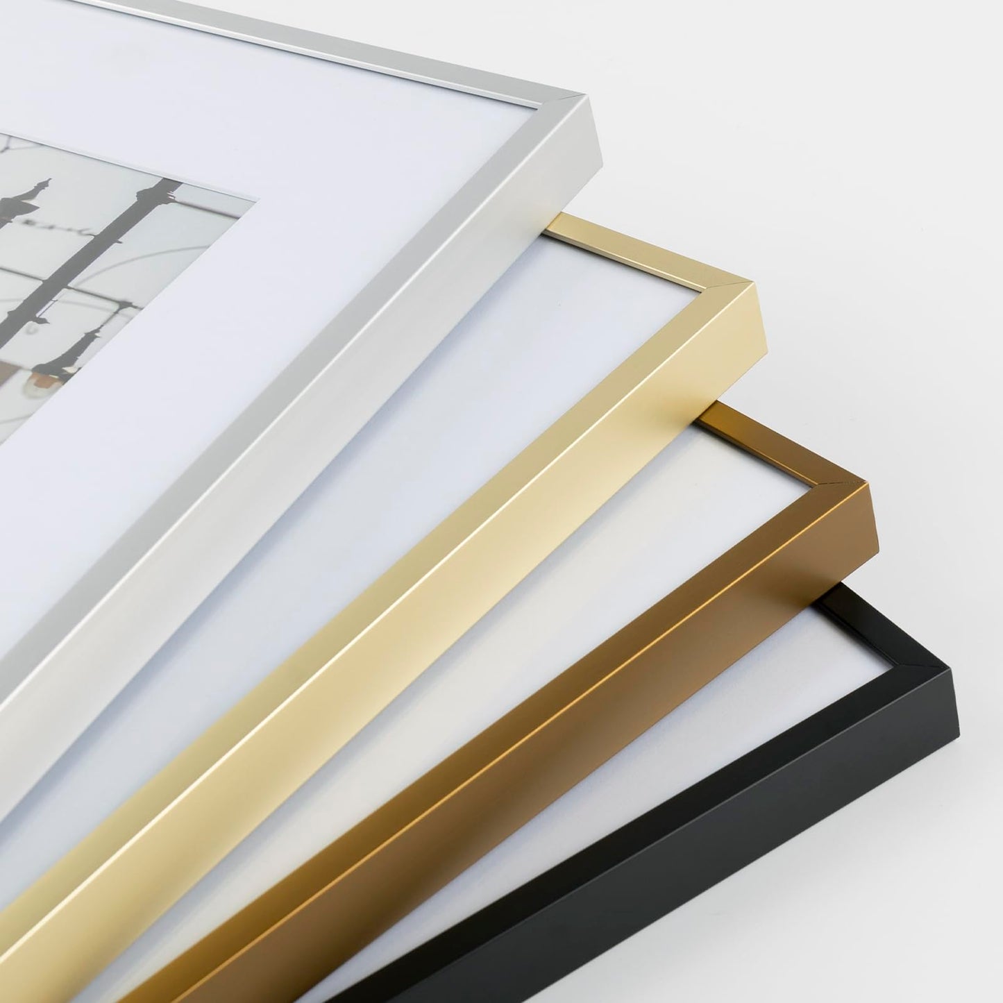 Frametory, Gold Aluminum Picture Frame with Removable Mat - Set of 7 Includes Four 5x7, Two 8x10, One 11x14 - Real Glass Front - Simple Gallery Wall Frames for Art Prints and Posters