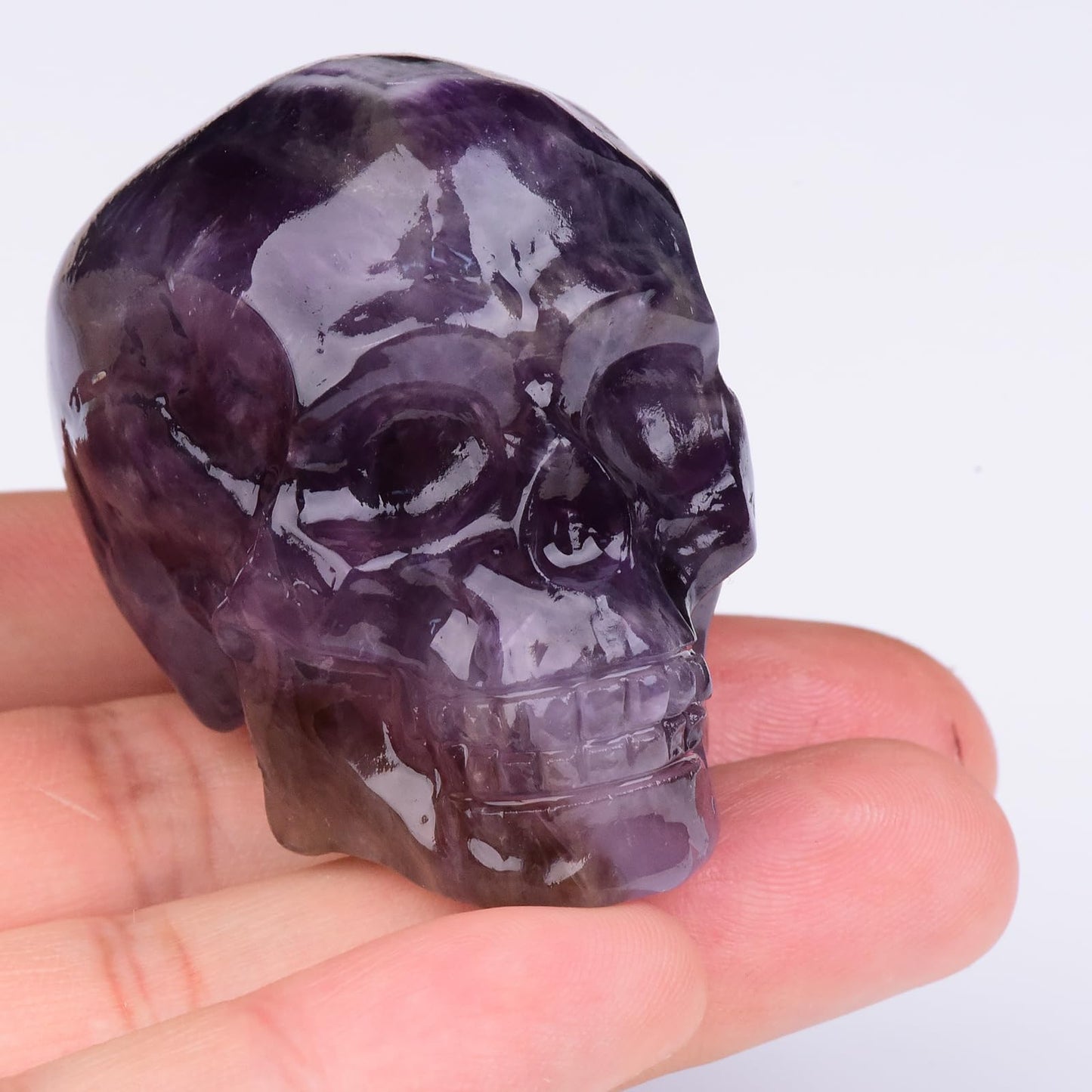 QLRSUXN 2 Inch Dream Amethyst Crystal Skulls Decor,Human Skull Sculpture Statues Healing Crystal Decor,Halloween Skull Figurines,Home Office Decoration Christmas Meditation Gifts for Men Women