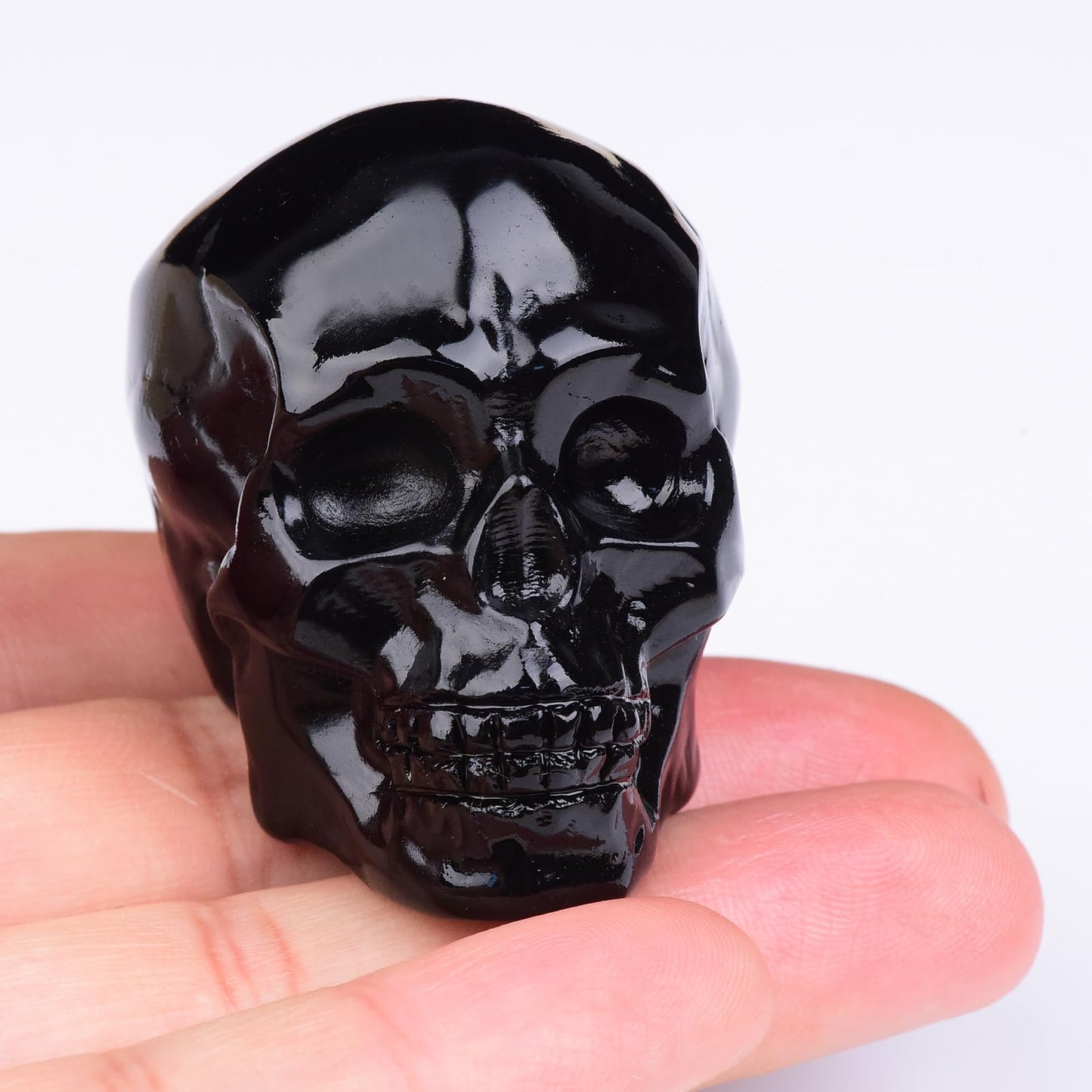 QLRSUXN 2 Inch Black Obsidian Crystal Skulls Decor,Human Skull Sculpture Statues Healing Crystal Decor,Halloween Skull Figurines,Home Office Decoration Christmas Meditation Gifts for Men Women