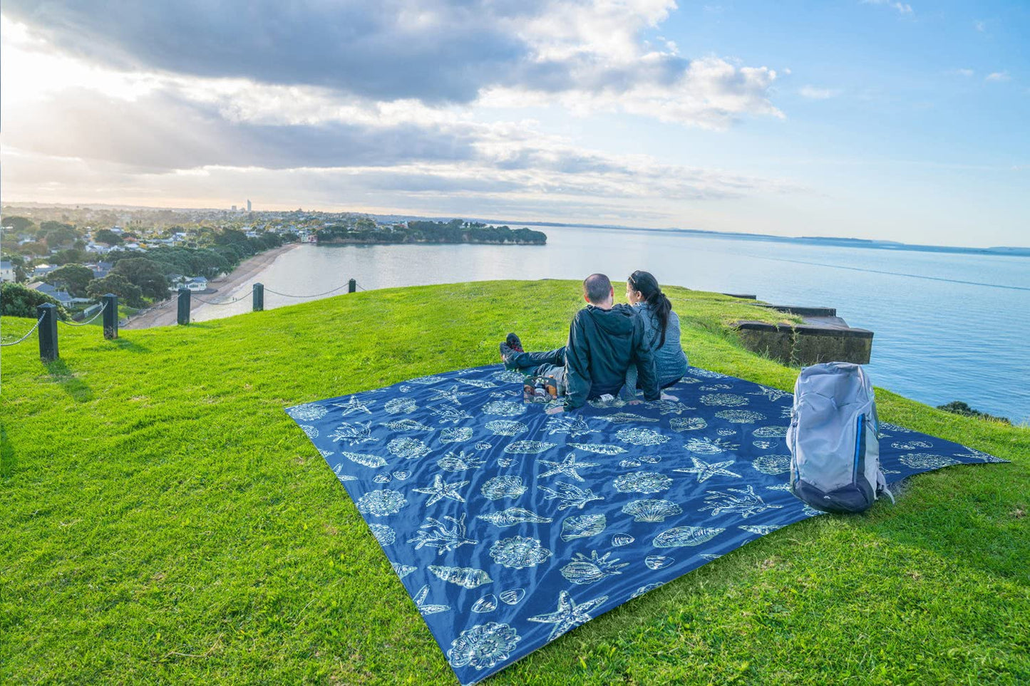 WEKAPO Beach Blanket Waterproof Sandproof Oversized, Extra Large Beach Mat Sand Free, Lightweight & Compact Sand Free Mat with 6 Stakes & 4 Corner Pockets (Blue Sea Shells, 8 x 7 FT (1～4 Person))