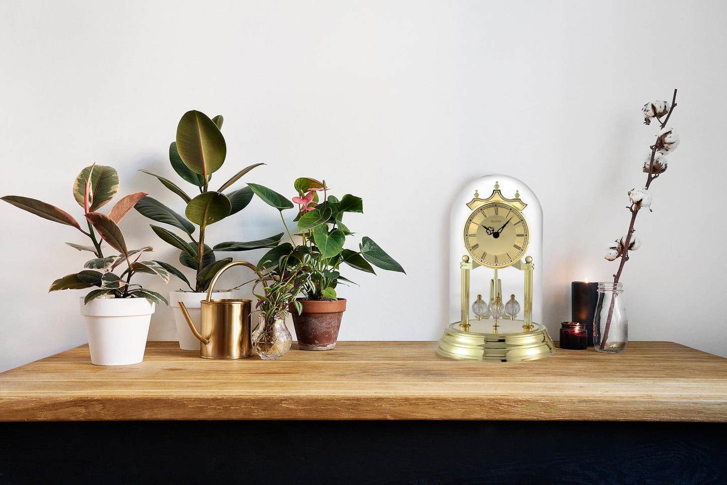 Bulova Tristan I Desk and Table Clock | Model B8818 | Polished Brass Finish | Polished Metal Base | Floating Dial | Roman Numerals | Elegant Pendulum Design