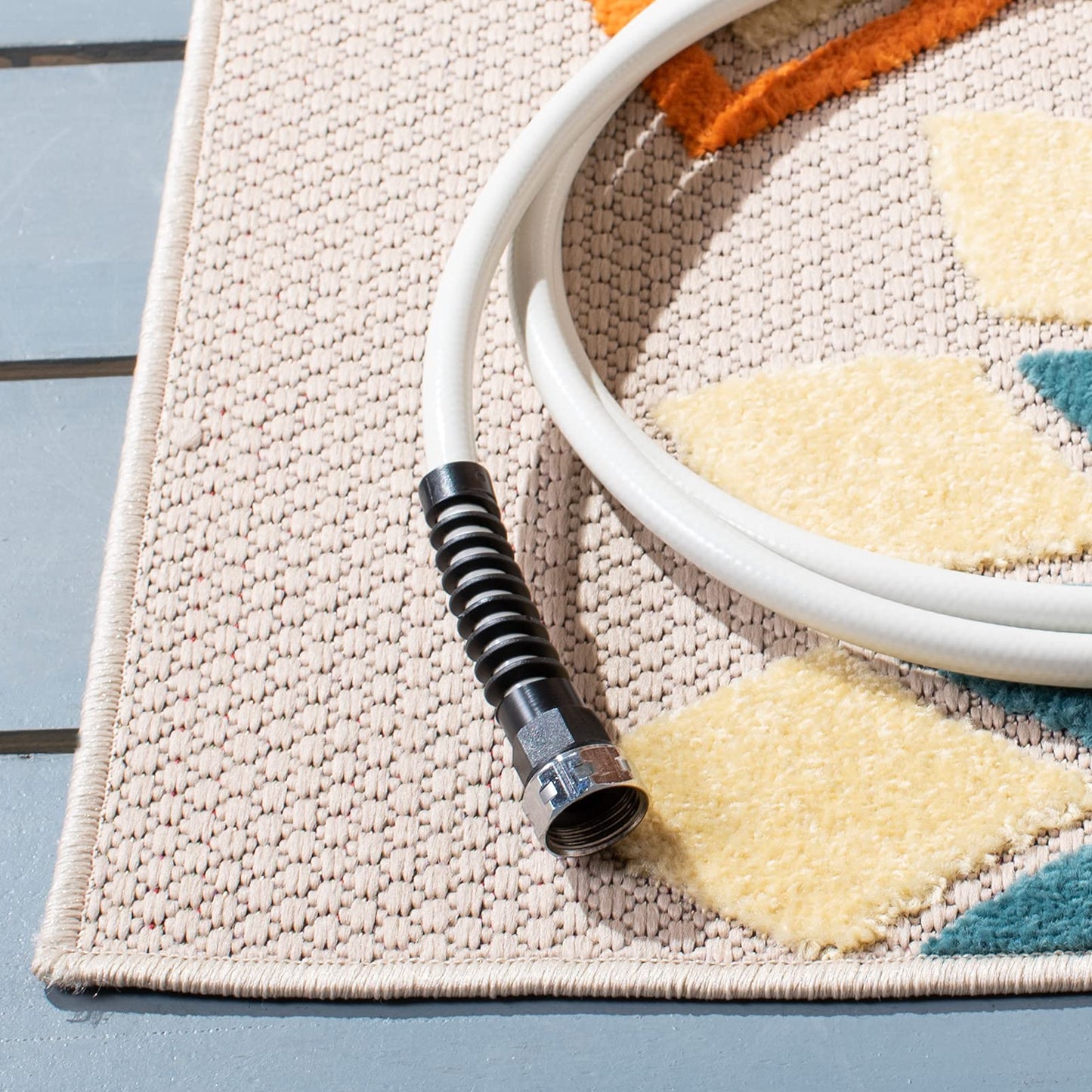 SAFAVIEH Washable Rug Outdoor Cabana Collection - 5'3" x 7'7", Ivory & Orange, Non-Shedding & Easy to Clean, Ideal for Patio, Backyard, Mudroom (CBN328A)