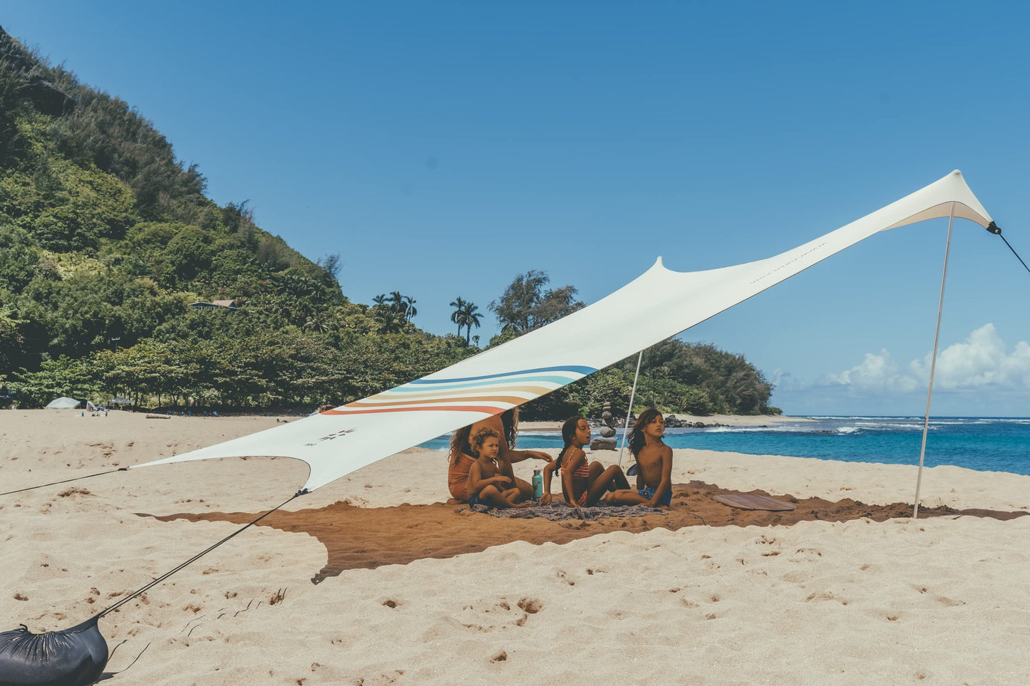 Neso Grande Portable Beach Tent Sun Shelter - Lightweight Beach Shade Canopy - Easy Setup for Family Outings - Patented Reinforced Corners - UPF 50+ Sun Protection - 7ft Tall, 9 x 9ft - Rainbow