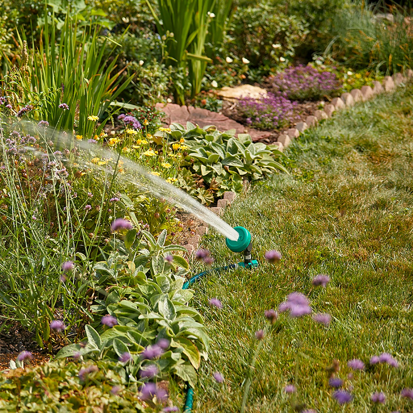 Gilmour Adjustable Spot Sprinkler with Spike Base, Pivoting Multi Pattern Sprinkler Head for Targeted Coverage in Flower Beds and Vegetable Gardens