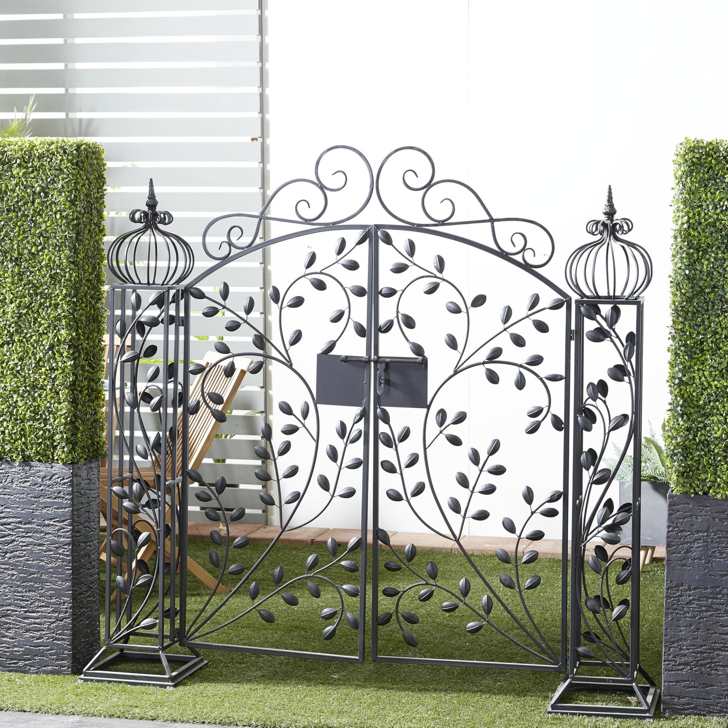 Deco 79 Metal Indoor Outdoor Scrollwork Arched Gate Garden Arbor with Vines and Latch Lock Closure, 70" x 15" x 65", Black