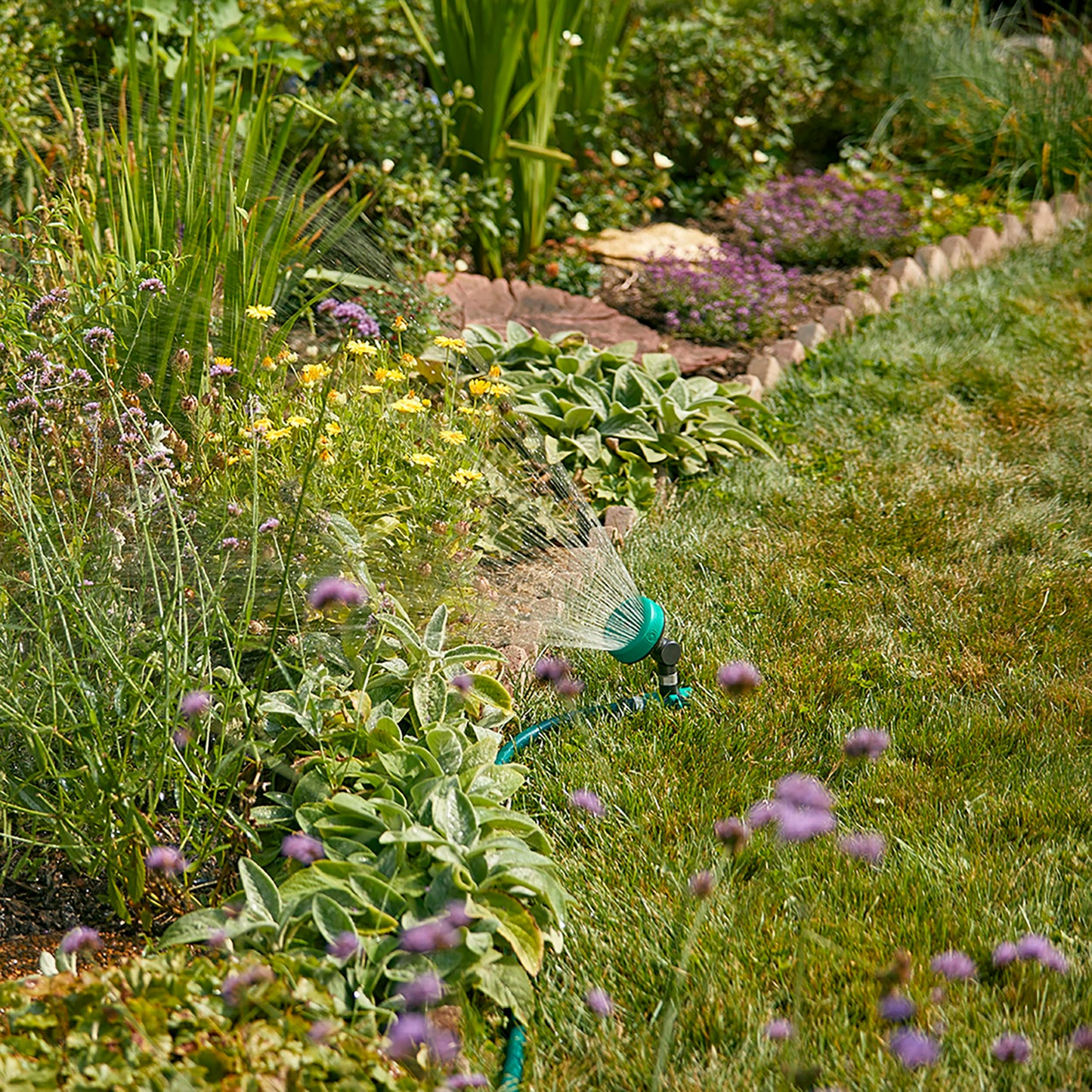 Gilmour Adjustable Spot Sprinkler with Spike Base, Pivoting Multi Pattern Sprinkler Head for Targeted Coverage in Flower Beds and Vegetable Gardens