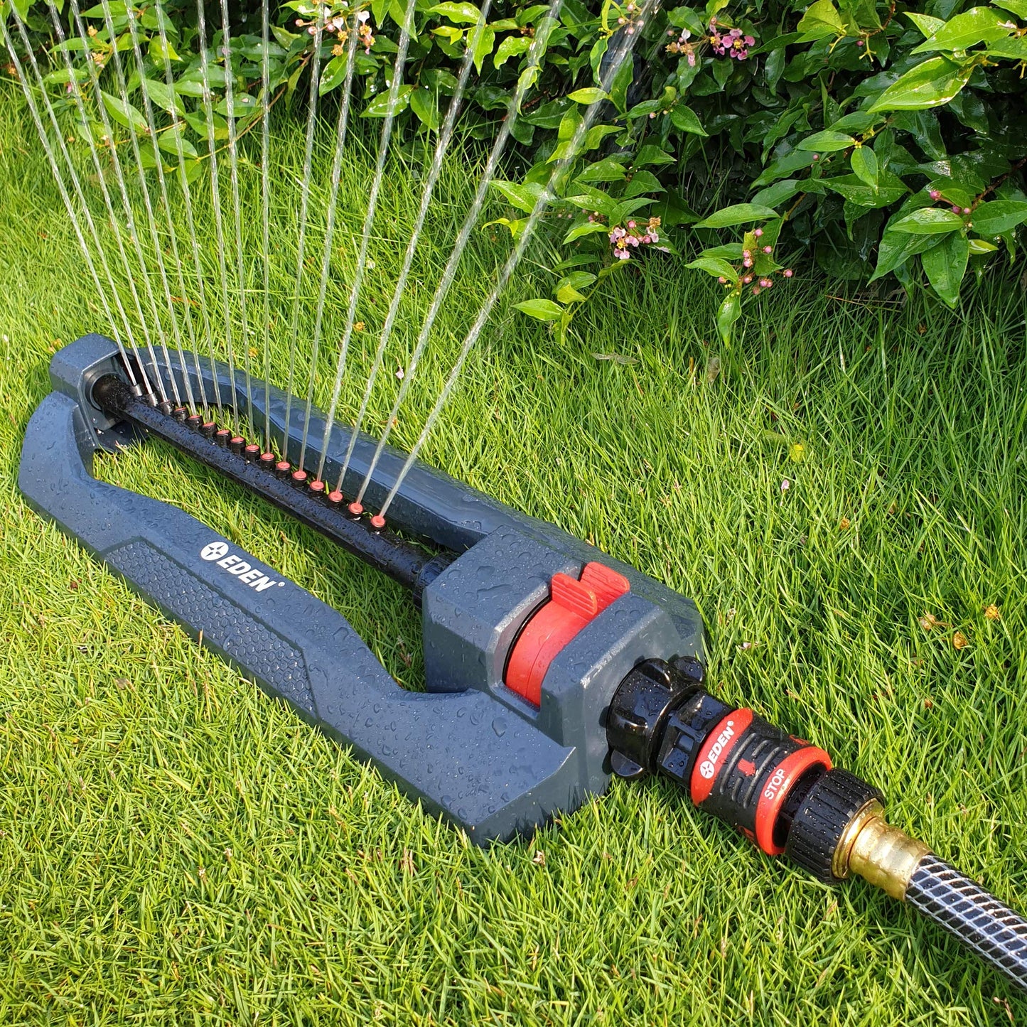 Eden 96213 Essential Turbo Oscillating Water Sprinkler, Covers Up to 3,600 sq. ft., 16 Nozzles, Weighted Base, Adjustable Range, Quick Connect Bundle, Dark Grey, Red, Silver